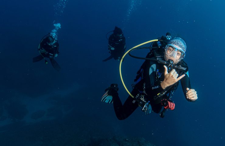 Scuba divers at the Gordo banks dive site